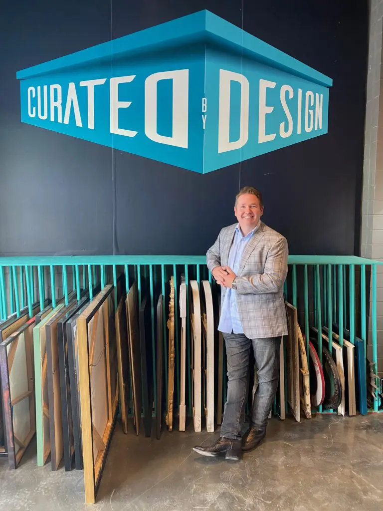 Real Estate agent David B. Atkins of Martha Turner Sotheby's International Realty is lord of a 13,000 sq.ft. warehouse filled with furniture for staging homes for sale.  (Photo by Shelby Hodge)