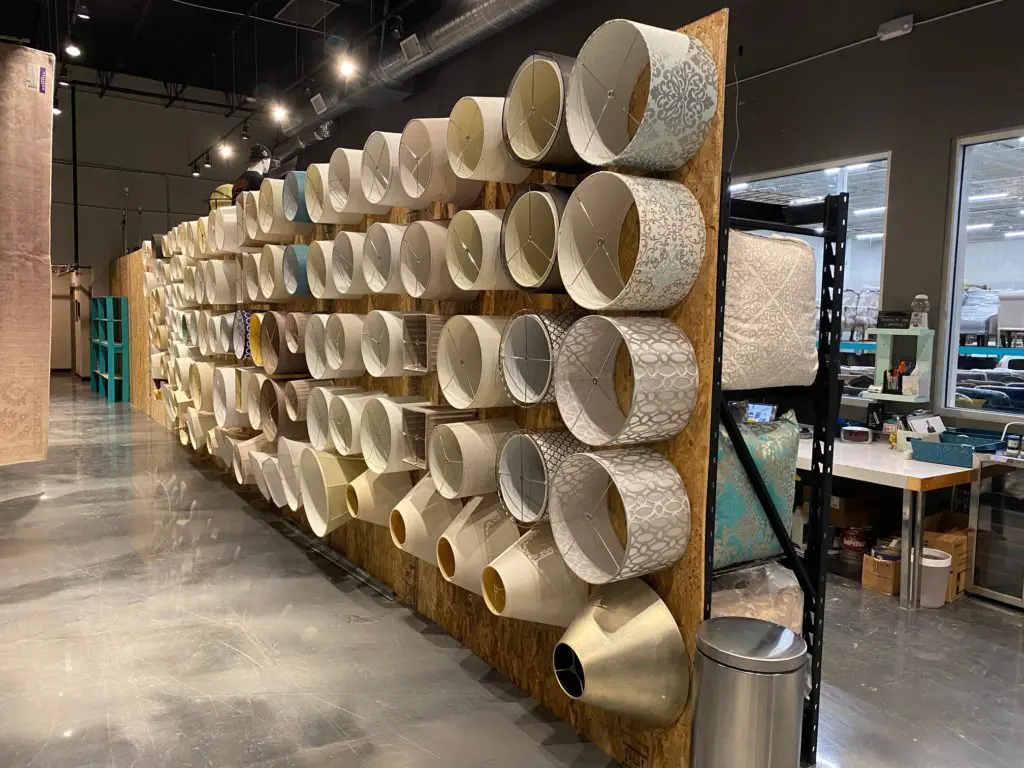 Scores of lamp shades are artistically displayed in David B. Atkins' warehouse on the Gulf Freeway. (Photo by Shelby Hodge)