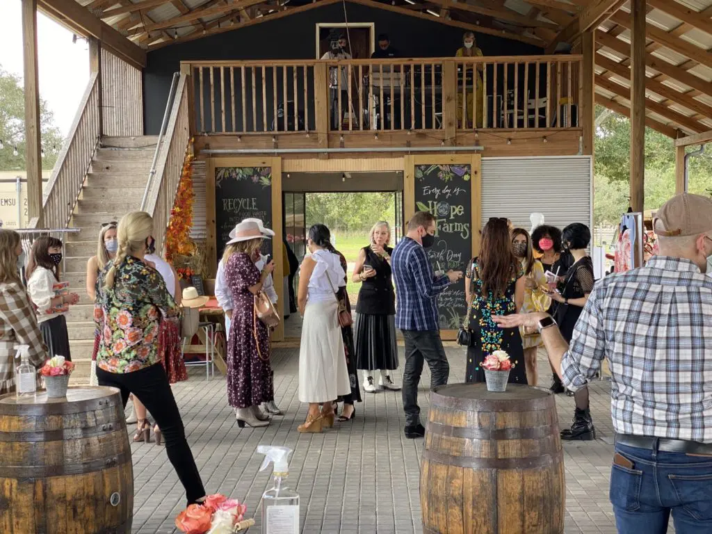 The ladies gather at Hope Farm’s Fashion in the Fields outing benefiting Recipe for Success. (Photo by Shelby Hodge)