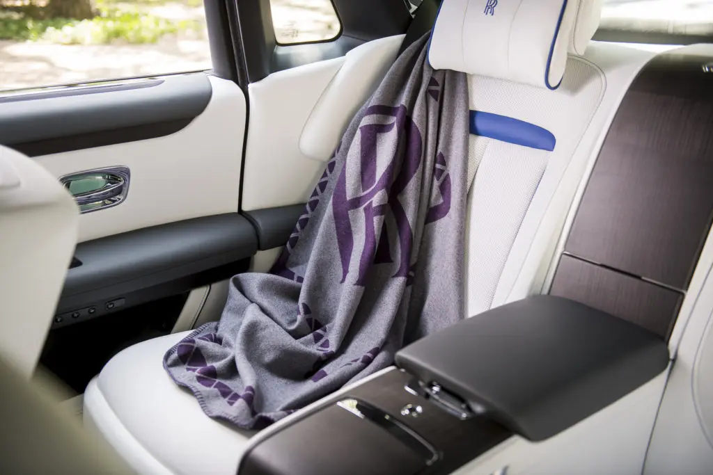 The ultimate Rolls-Royce Ghost accessory is the cashmere throw that matches the hand-stitching in the colors selected by the buyer. (Photo by James Lipman for Rolls-Royce)