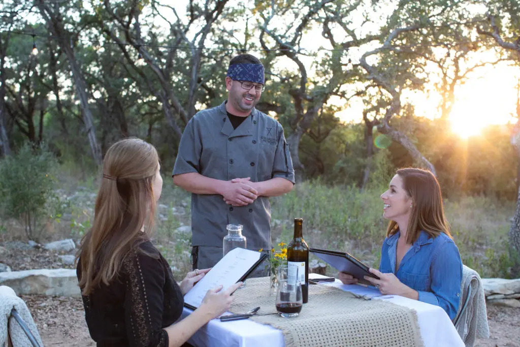 Dining outdoors or dining at the Three Peaks Lodge are options at The Collective Hill Country.