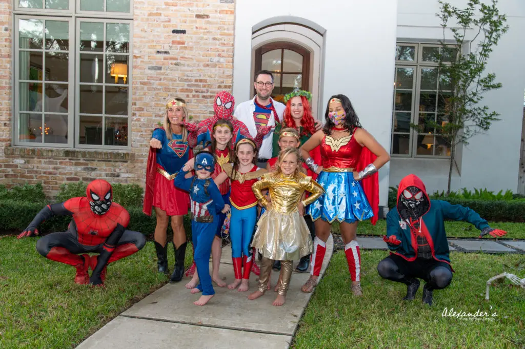 The Children's Museum Houston virtual gala brought together families across the city for a superhero evening, here the Molly and Matt LaFauci and Lexi and Aaron Boudreaux families celebrate.