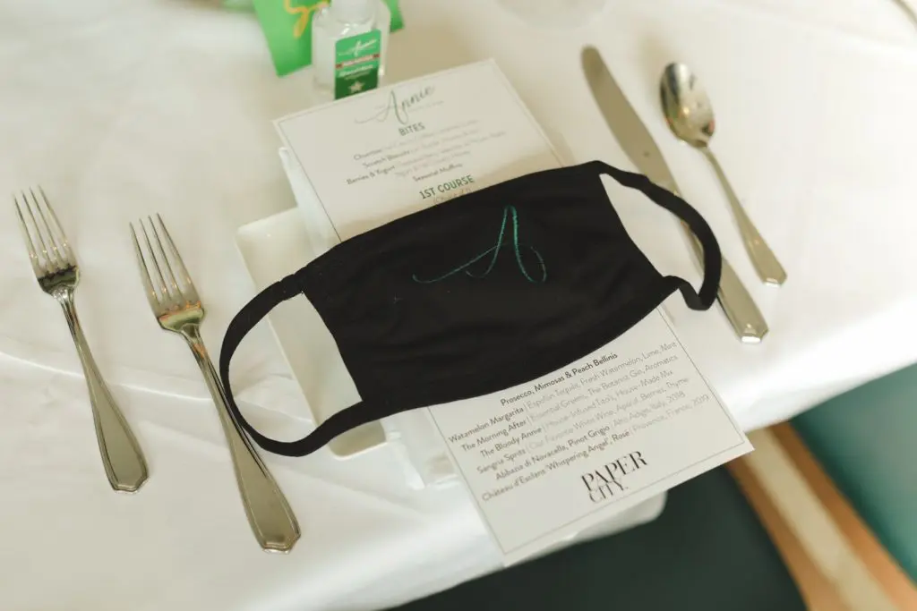 The Annie Cafe logo mask awaits each guest as she sits for the Sunday brunch extravaganza. (Photo by Johnny Than)