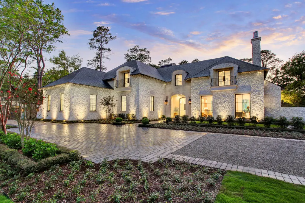 This Bunker Hill estate boast more than an acre of landscaped grounds and all the amenities and touches one expects from Nouveau Luxury Builders and Tracy Design Studio.