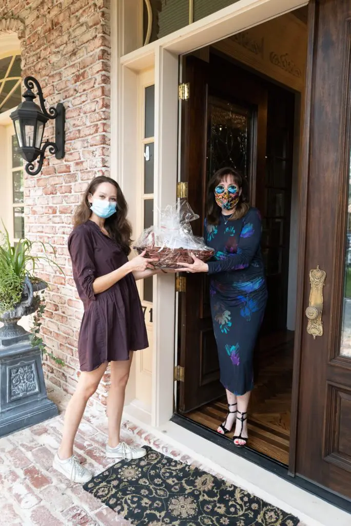 CAP supporter Elizabeth Stein receives her party pack in advance of the virtual gala. (Photo by Daniel Ortiz)