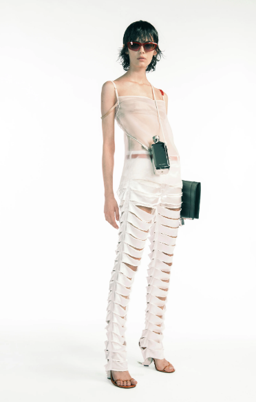 Givenchy slashed trousers and sheer blouse. (Photo courtesy of Givenchy)