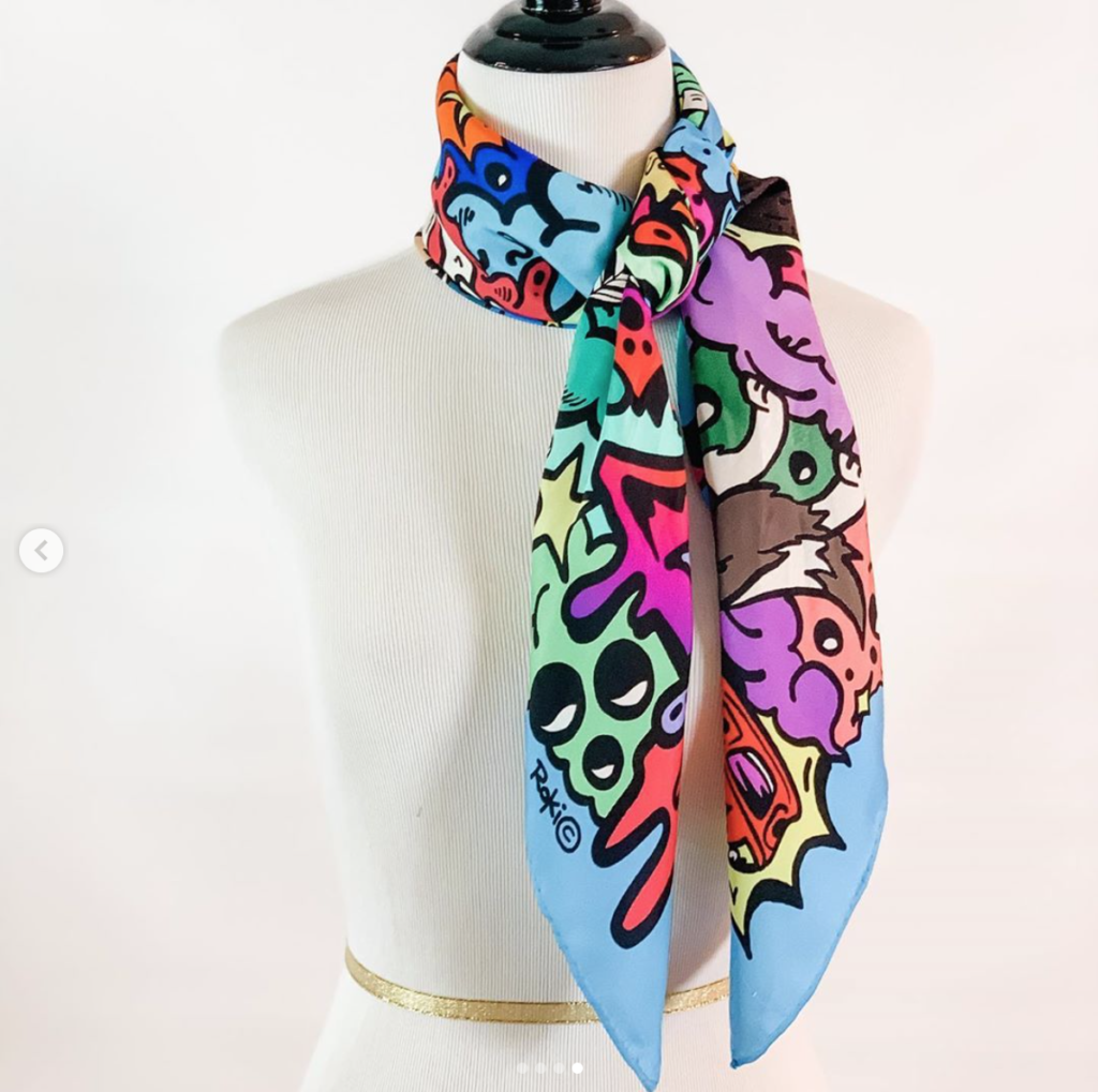 The versatility of the RoKi silk scarves is illustrated here. This 'D' scarf benefits the Boy Scouts of America.