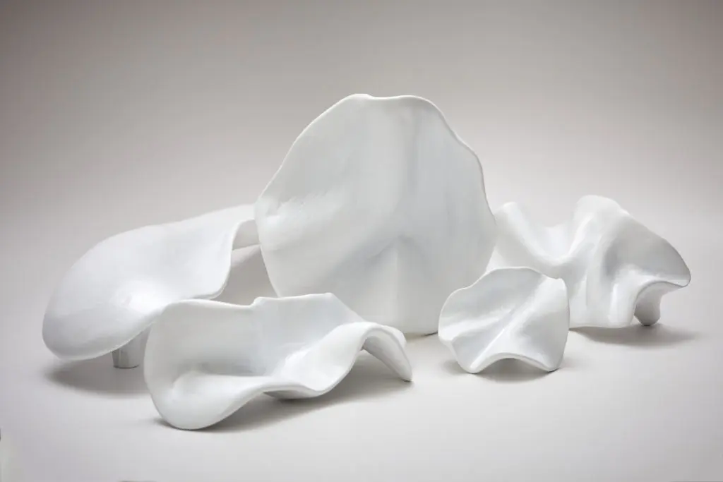 Various shapes of Pinch hardware in matte white.