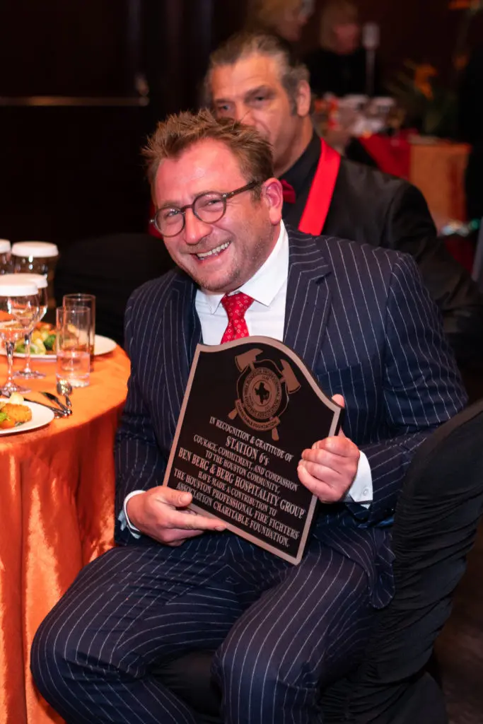 Benjamin Berg is honored by Houston Fire Fighters at the Red Hot Gala in November 2020. (Photo by Michelle Watson CatchlightGroup.com)
