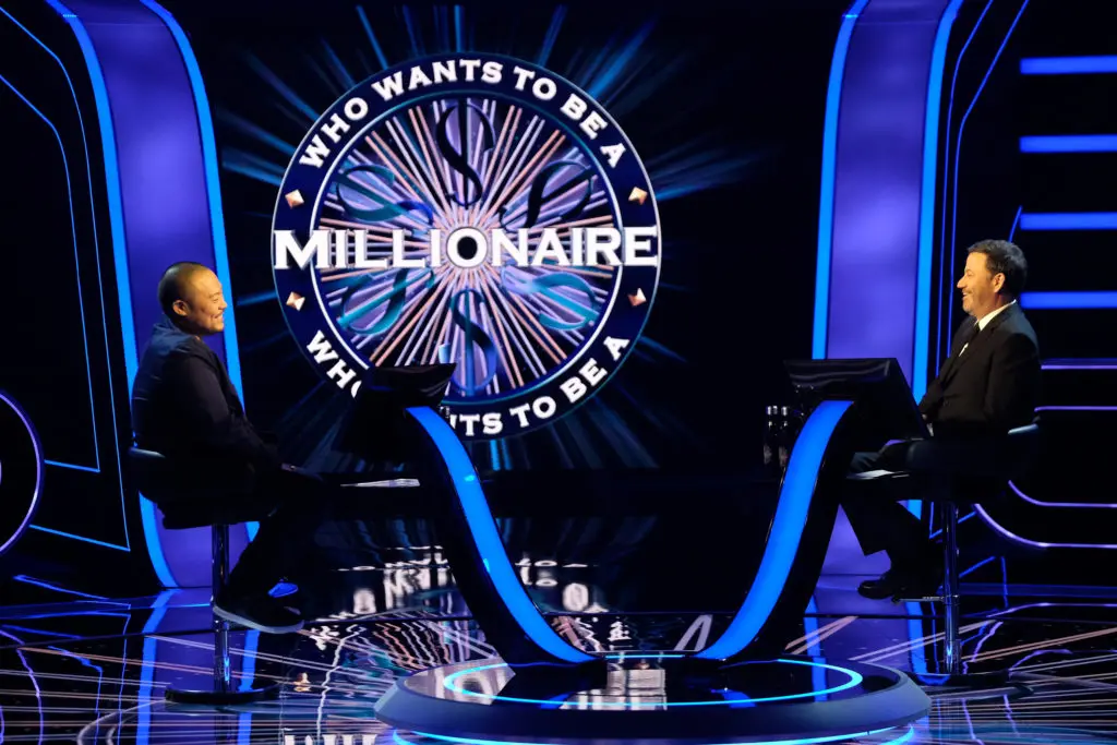 Chef David Chang, with Jimmy Kimmel, is on the hot seat at 'Who Wants To Be a Millionaire. (Photography: ABC/John Fleenor)
