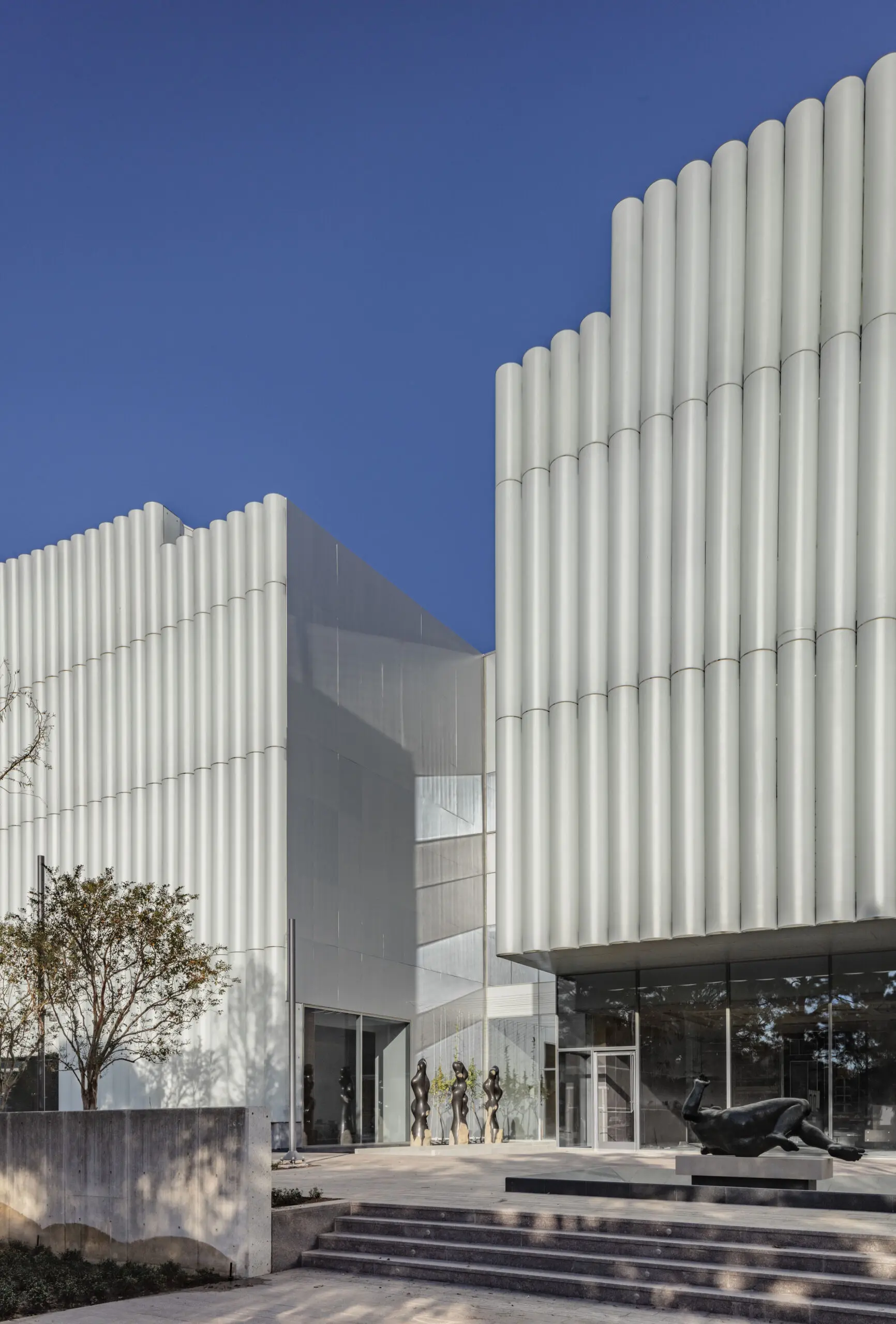 The west facade of the Nancy and Rich Kinder Building, designed by Steven Holl Architects. (Photo by Richard Barnes, Courtesy of the Museum of Fine Arts, Houston)