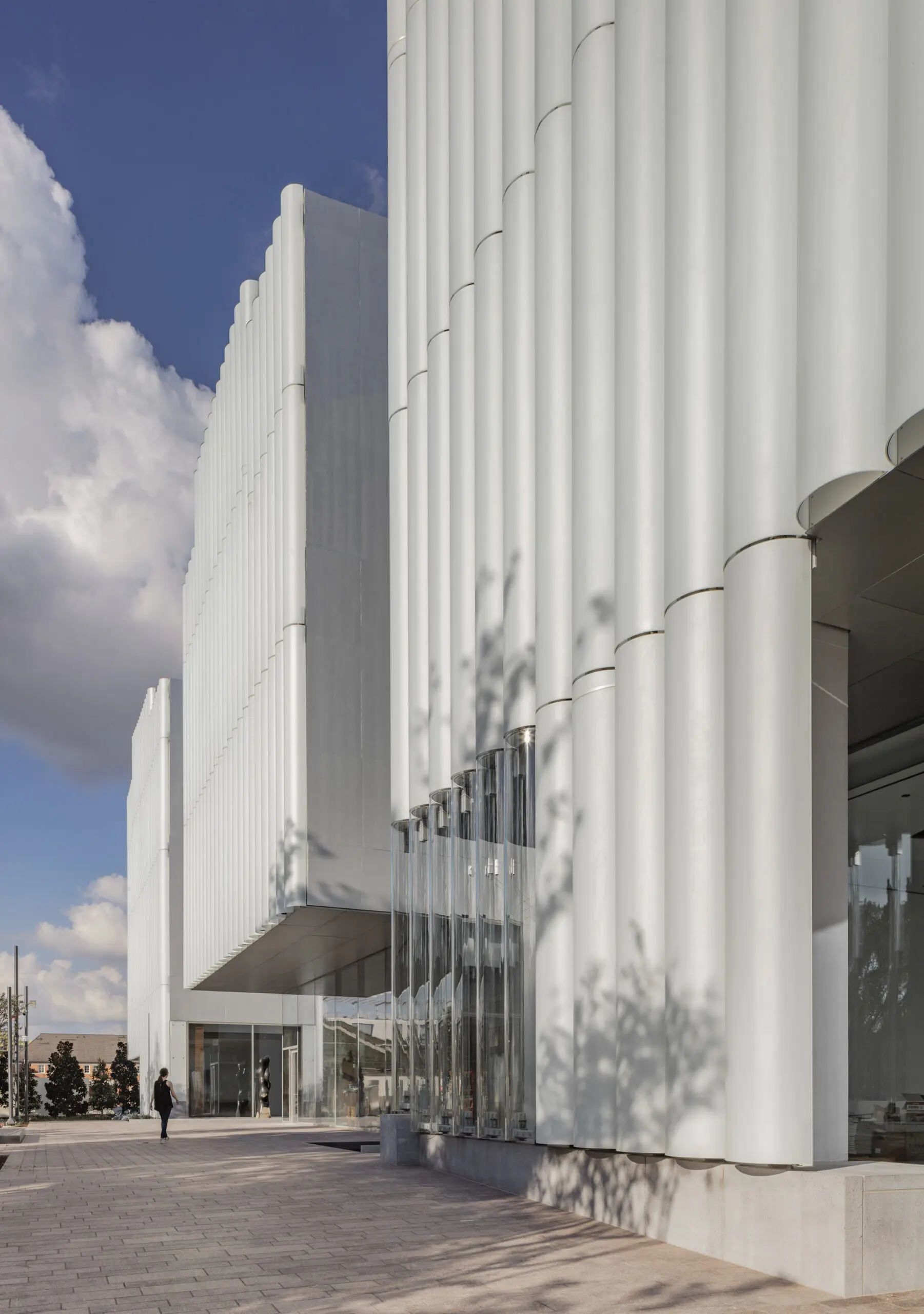 The Nancy and Rich Kinder building of the Museum of Fine Arts, Houston is constructed of translucent glass, concave pillars that give it a unique facade. (Photo by Richard Barnes, Courtesy of the Museum of Fine Arts, Houston)