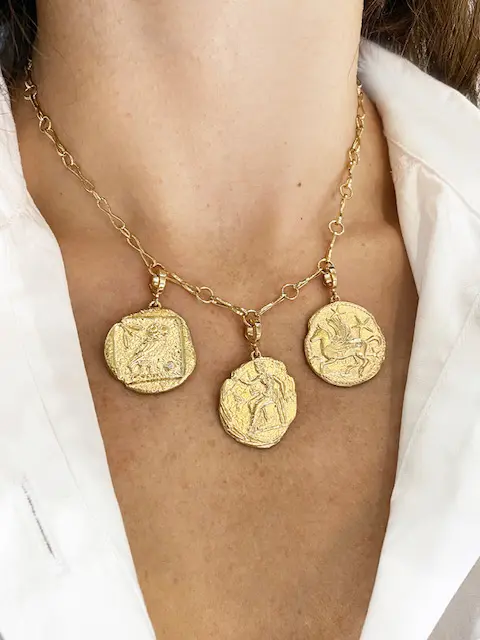 The Winged Pegasus Coin charm is just one of the unique treasures you can find at Ylang 23.