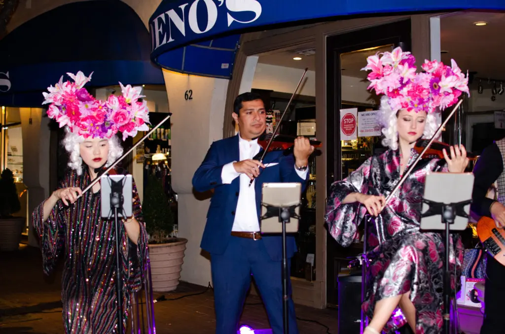 The Dallas String Quartet, donning ornate, 18th century-inspired flower crowns by Kyle Branch, played symphonic versions of modern favorites. (Photo by Cassandra Willis)