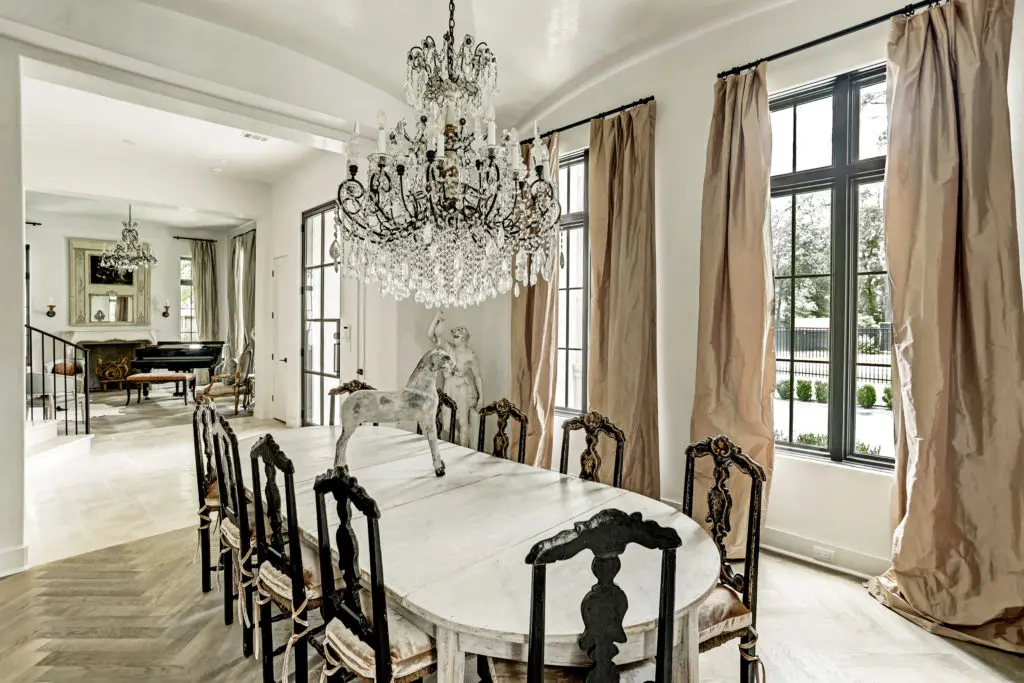 The formal dining room with aged French oak flooring at 722 Friar Tuck Lane.