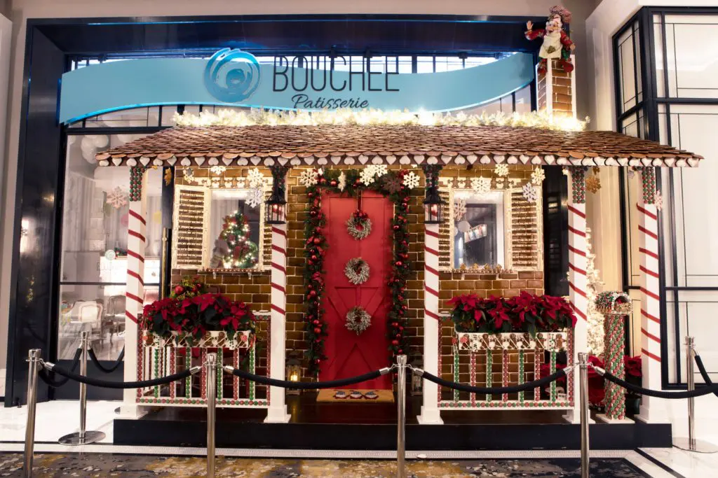 The charming gingerbread house on display outside of The Post Oak Hotel French pastry shop Bouchee. (Photo courtesy of Fertitta Entertainment)