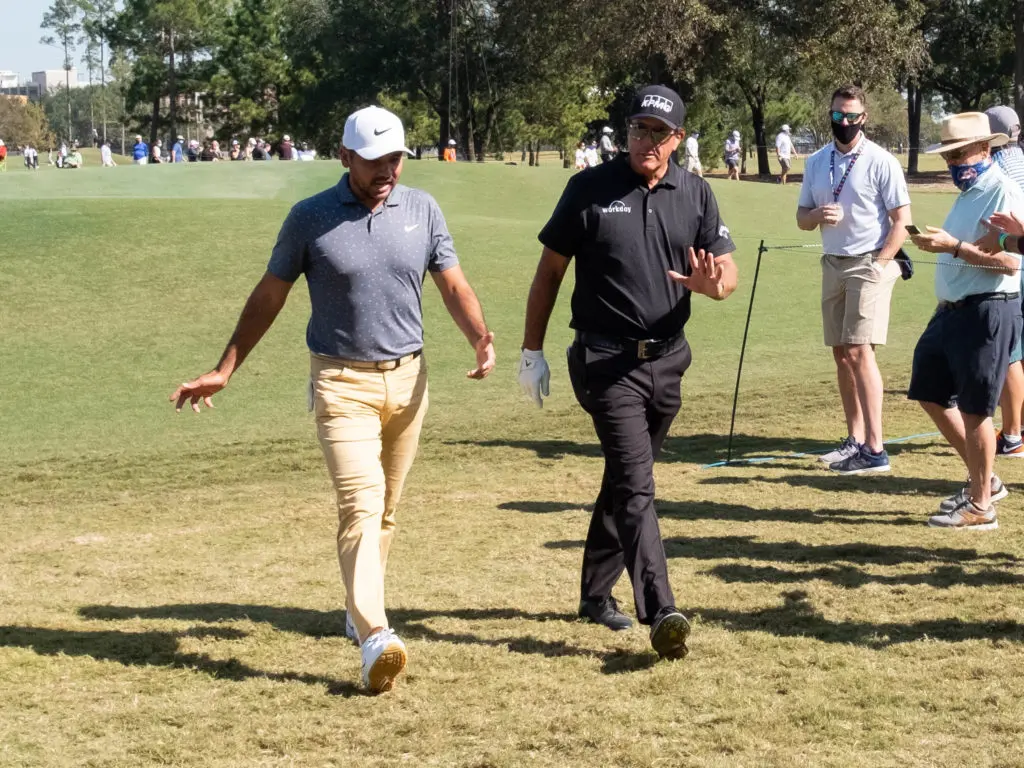 Jason Day and Phil Mickelson have plenty to talk about. (Photo by F. Carter Smith)