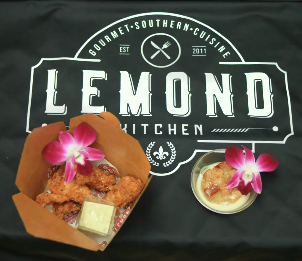 Lemond Catering prepared to-go food boxes for guests at Bering's 80th anniversary celebration. (Photo by Chris P. Bachman )