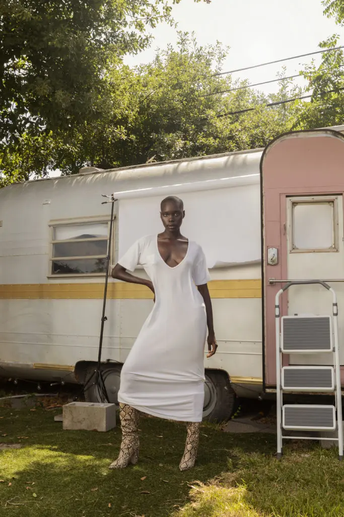 Work from home and stay comfy wearing CHAR's white deep v-neck dress.