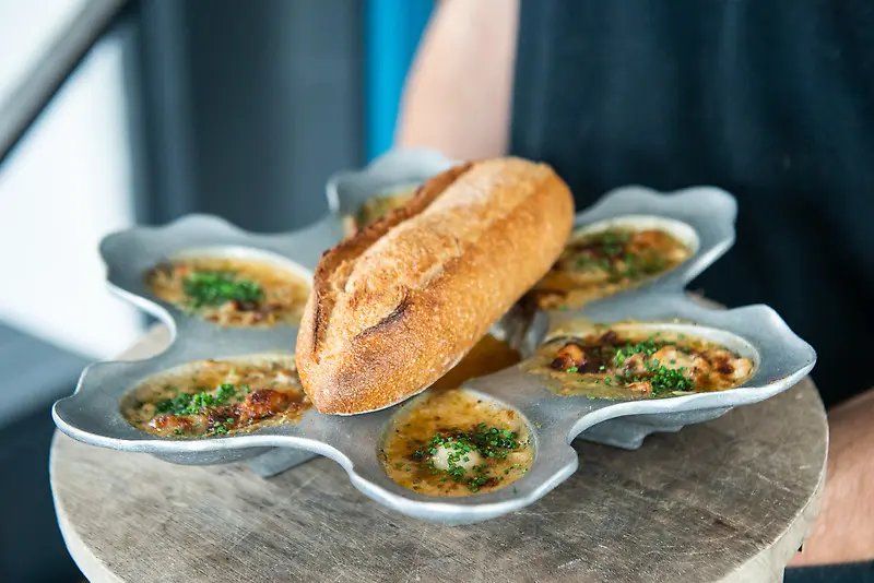 Roasted oysters are among the Southern Comfort foods to be on the One Fifth menu beginning December 8. (Photography by Jacklyn Warren for StarChefs) 