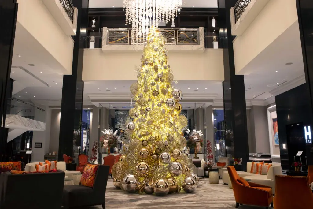 The massive Christmas tree in the lobby of the Post Oak Hotel sets the stage for a wondrous holiday-themed decor. (Photo courtesy of Fertitta Entertainment)