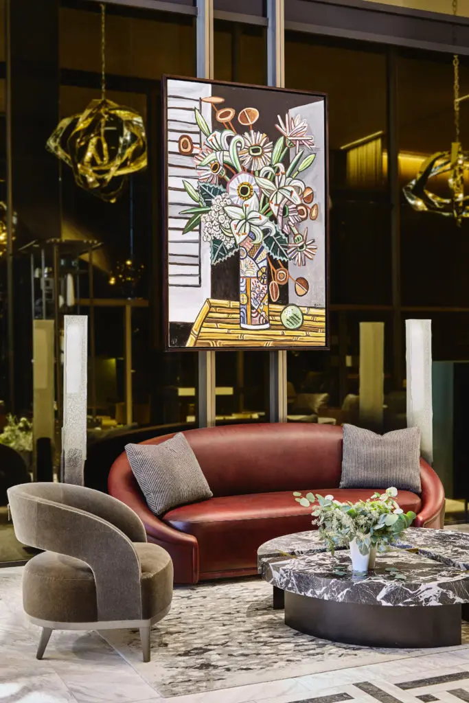 A painting by David Bates
hangs in the lobby. (Photo by Gustav Schmiege)