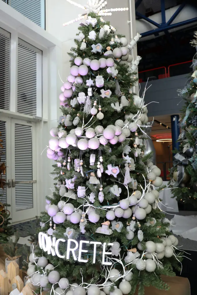 The Alley Theatre Deck the Trees display of decorated conifers. The Concrete Christmas by Natural. 