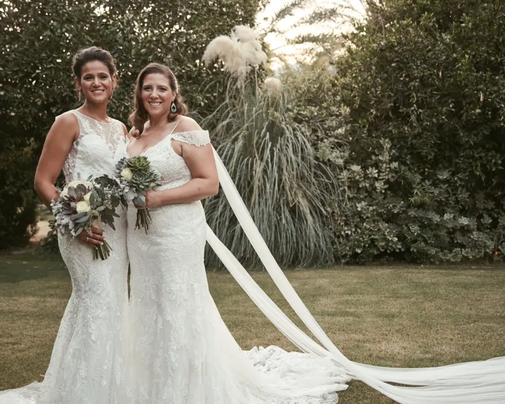 The brides found their dresses at Nordstrom, where an employee offered sweet support. “It’s hard when you're doing it on your own, especially when you feel like no one can be there with you either,” Alessandra says. “Because of everything happening. So, she was super sweet and like very motherly to us. (Photo by Tom Shirmacher)