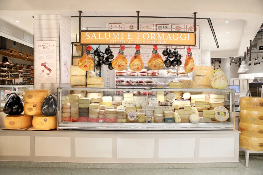 The Salumi & Formaggi stall includes five different types of prosciutto. (Photo by Allison David)