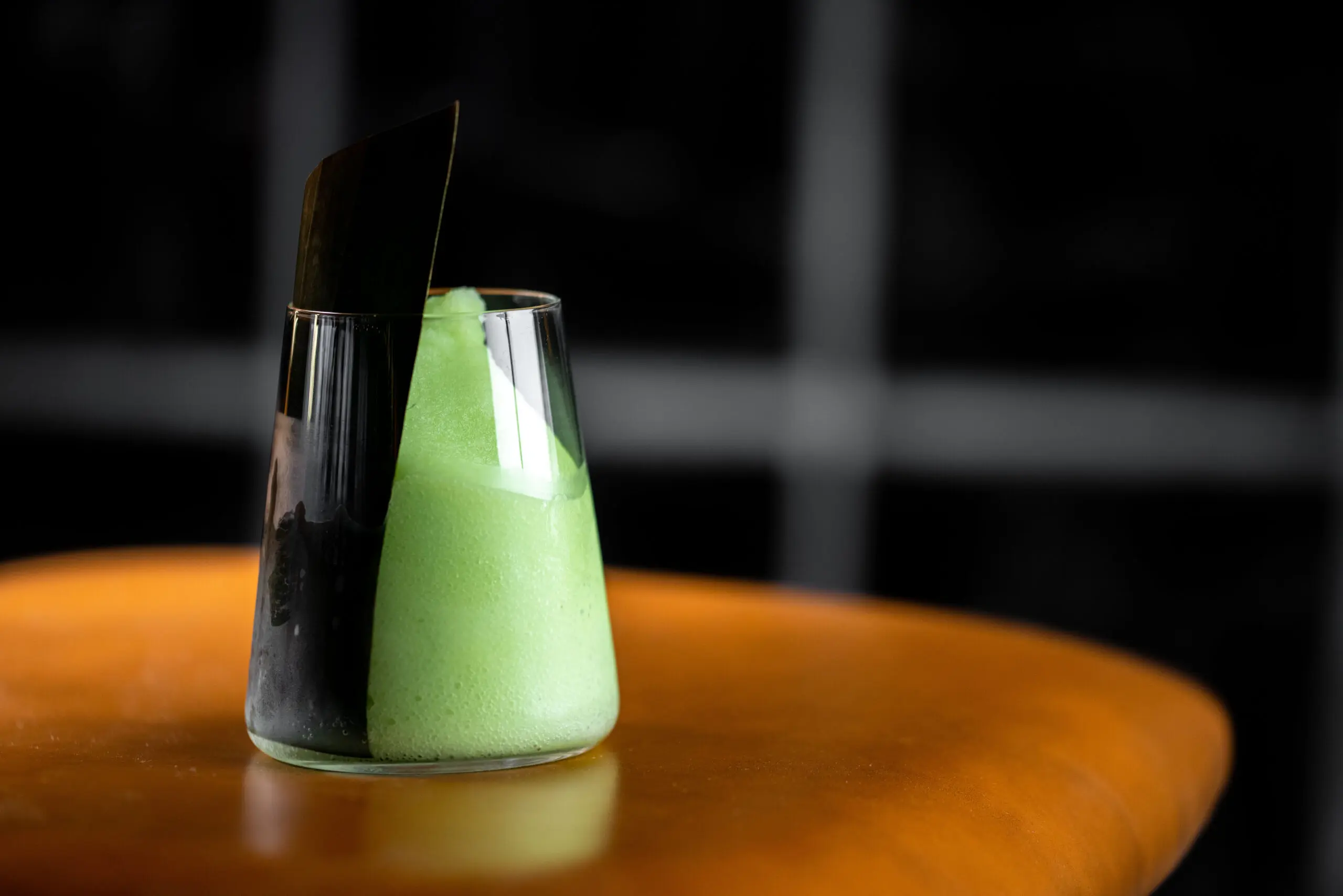 The Frozen Melon Ball at Ichi Ni San includes vodka, midori, yuzu, and orange essence. (Photo by Kathy Tran)