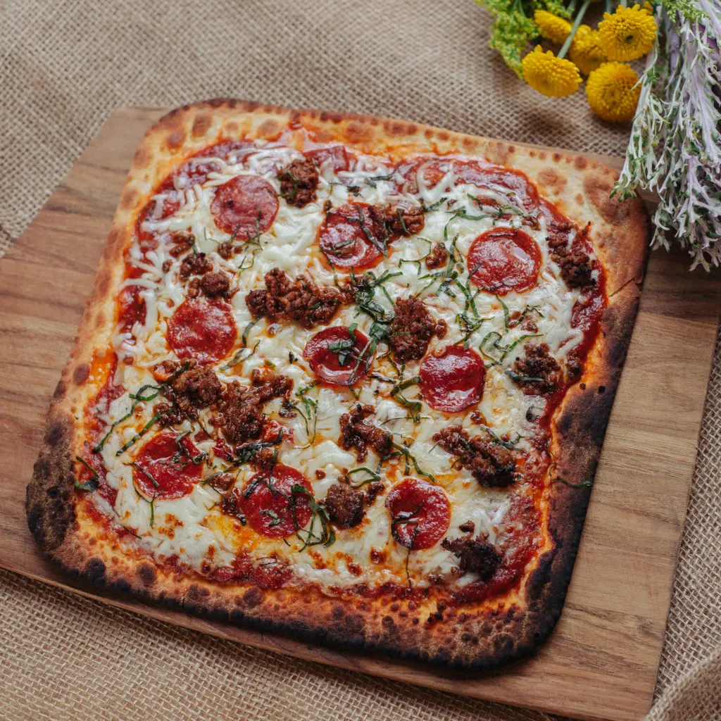 Far East Pizza Co. offers Asian-inspired pizzas like a halal beefs sausage & beef pepperoni pie. (Courtesy)