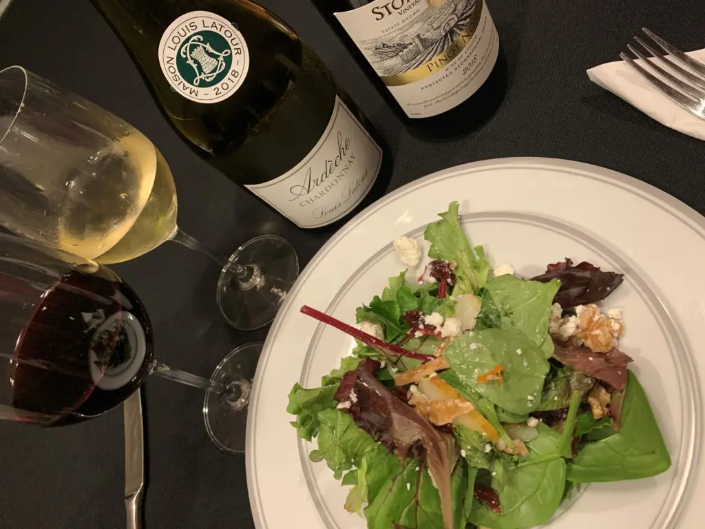 Liliana Soltero & Michael Hawkins are ready for the Jackson & Company first course salad. (Photo by CatchLightGroup)