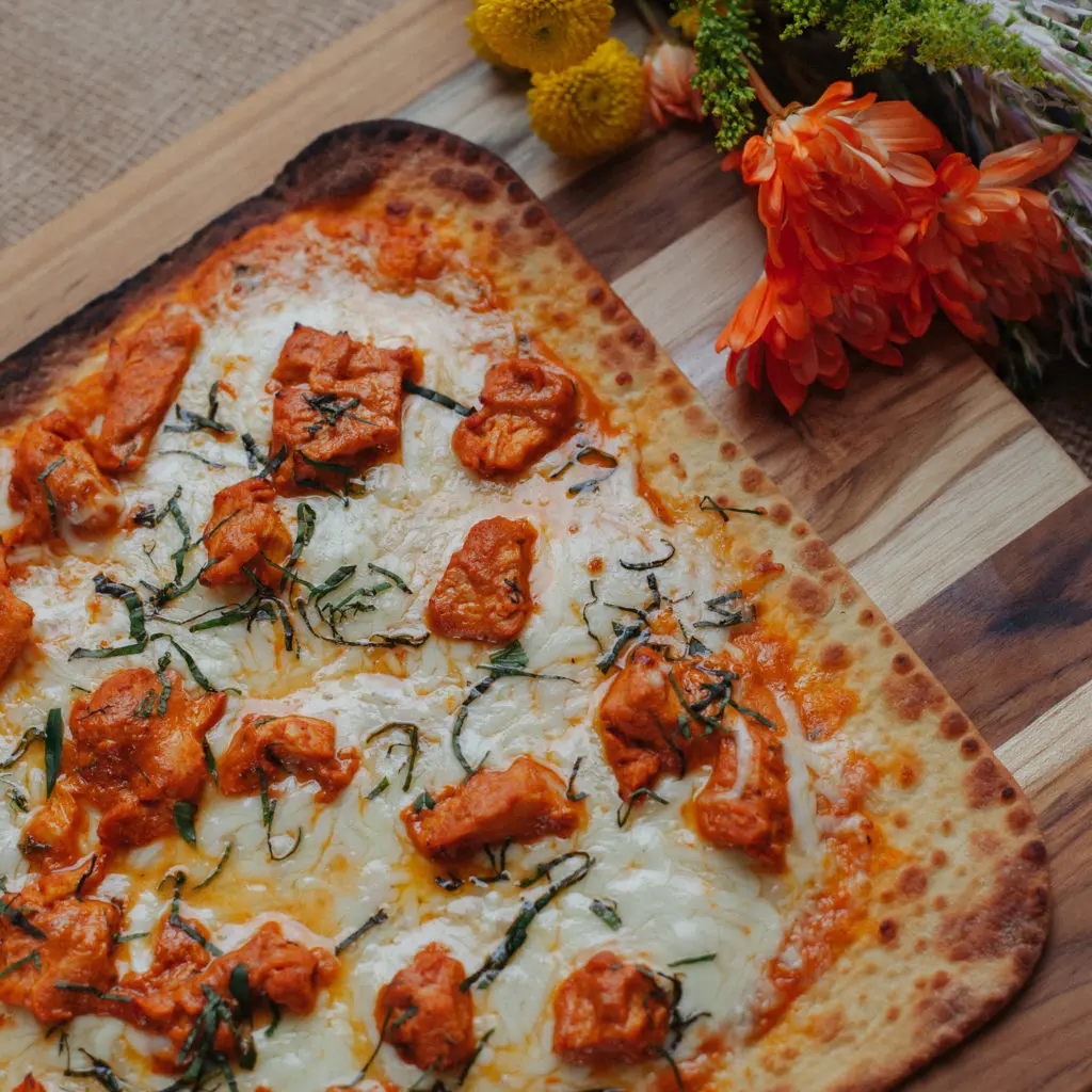 Get your chicken Tikka pizza delivered from Far East Pizza Co. (Courtesy)