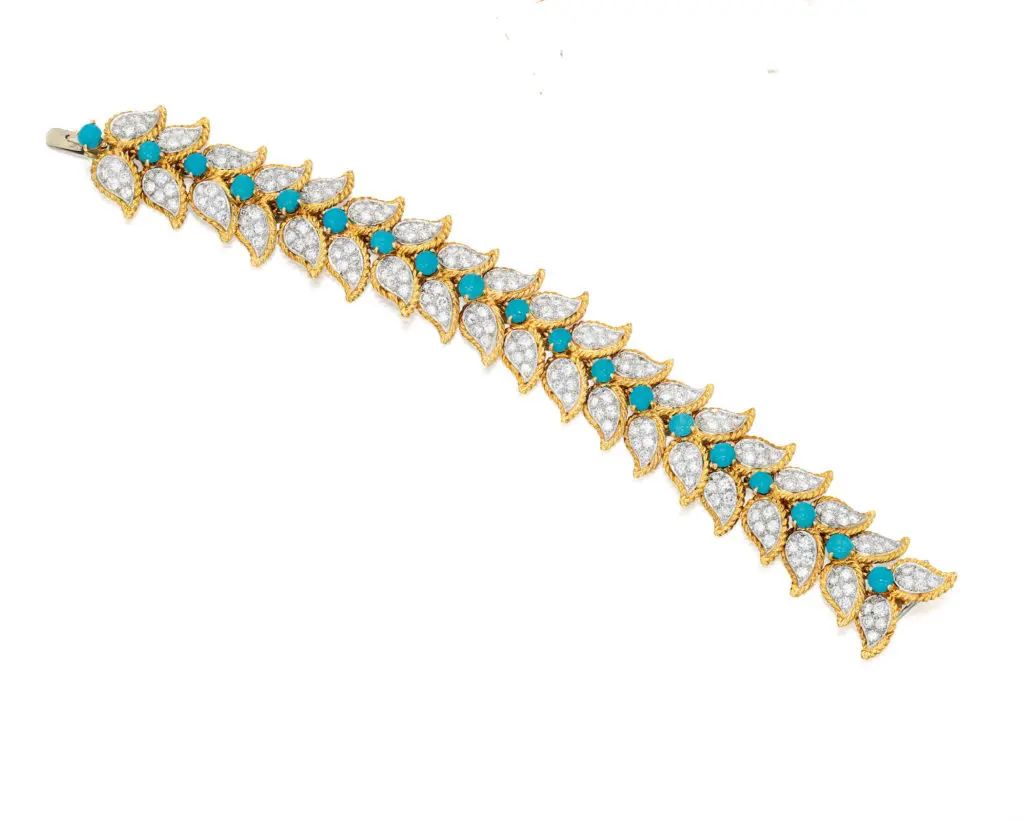 <b>Turquoise and Diamond Bracelet, Van Cleef & Arpels</b>

Of foliate motif, centering turquoise cabochons, accented with numerous round diamonds, length 6¾ inches, signed V.C.A., numbered N.Y.29008; circa 1960. Estimate $15/20,000
