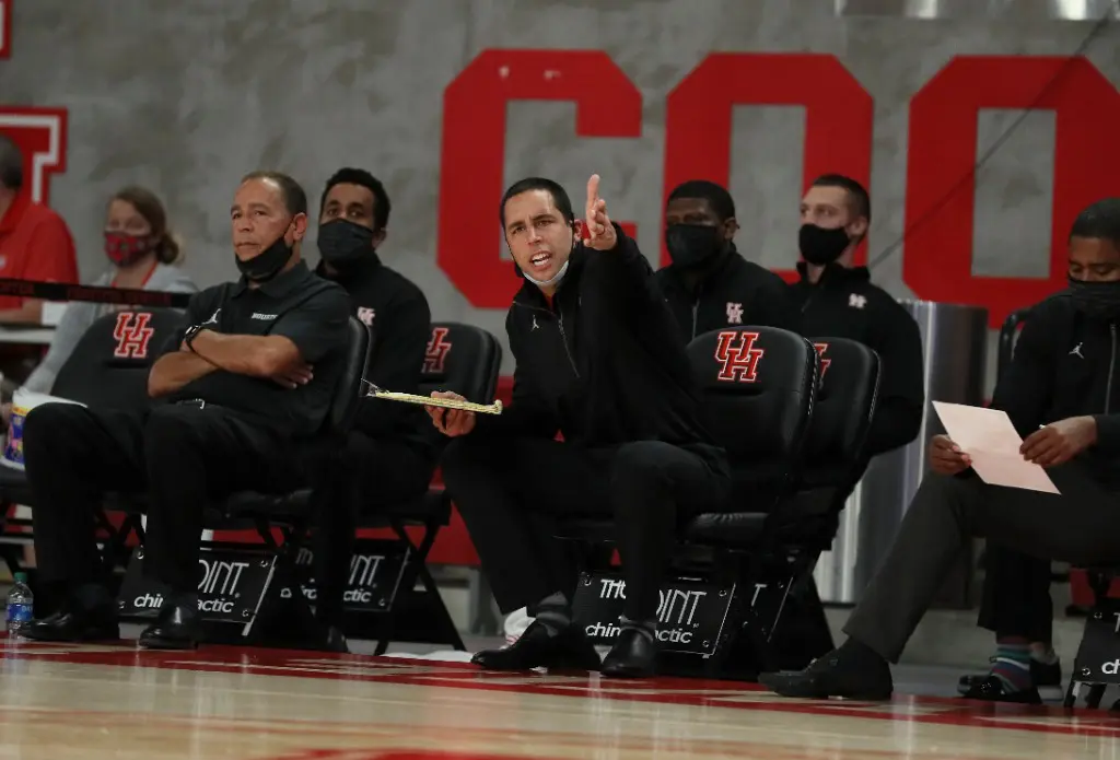 Kelvin Sampson and Kellen Sampson are coaches to the core. (Photo by UH Athletics)