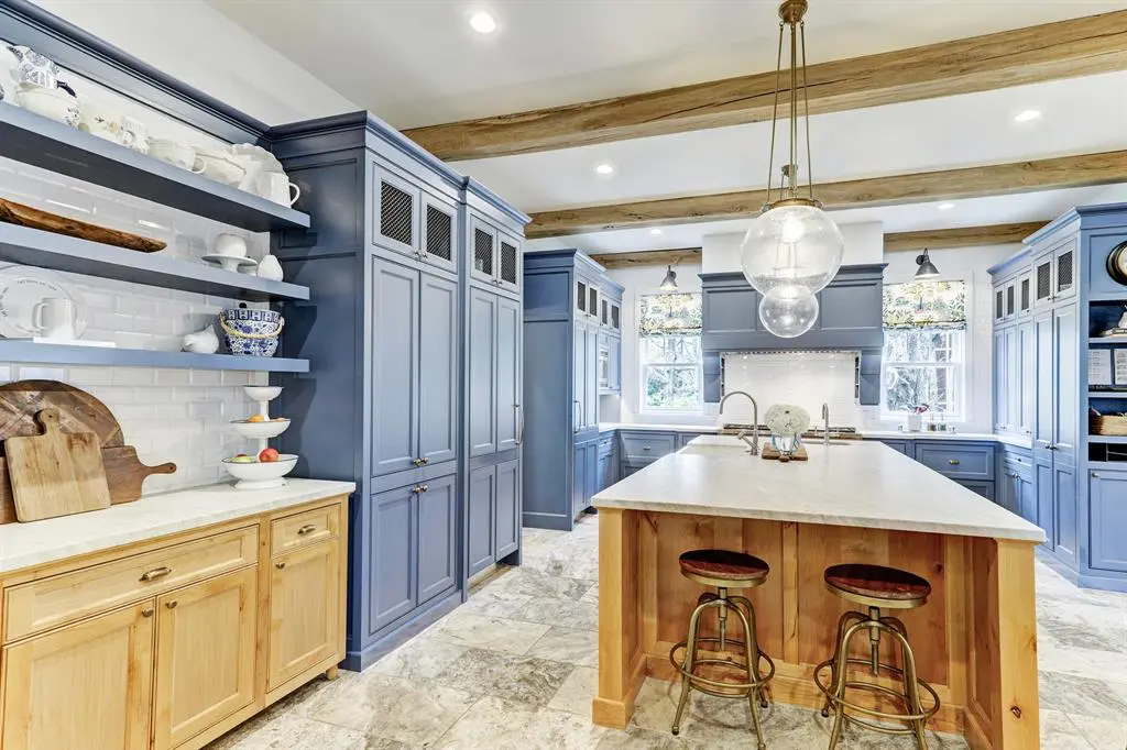 The country style kitchen at 3424 Sunset Boulevard enjoys contemporary amenities.