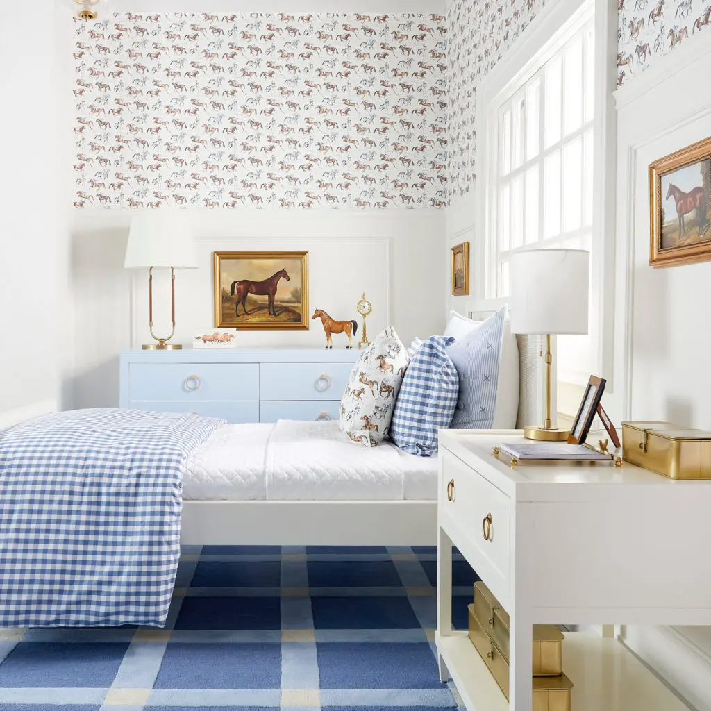 Cait Kids Horse & Jockey wallpaper ($185), Horse & Jockey pillow ($88 - $108), and Berwick Rug in navy ($148 - $2,598) 