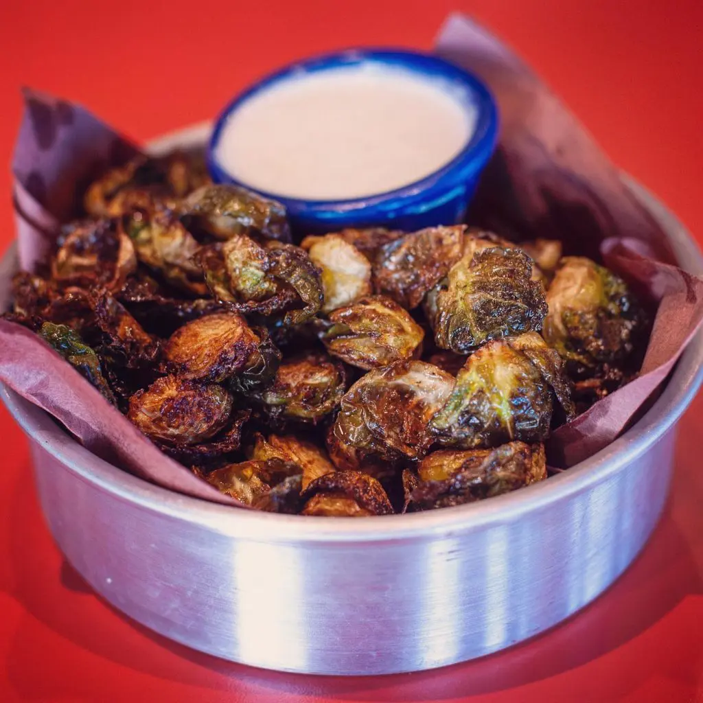 Shareables like Brussels sprouts, hummus, and meatballs are on the menu. (Courtesy)