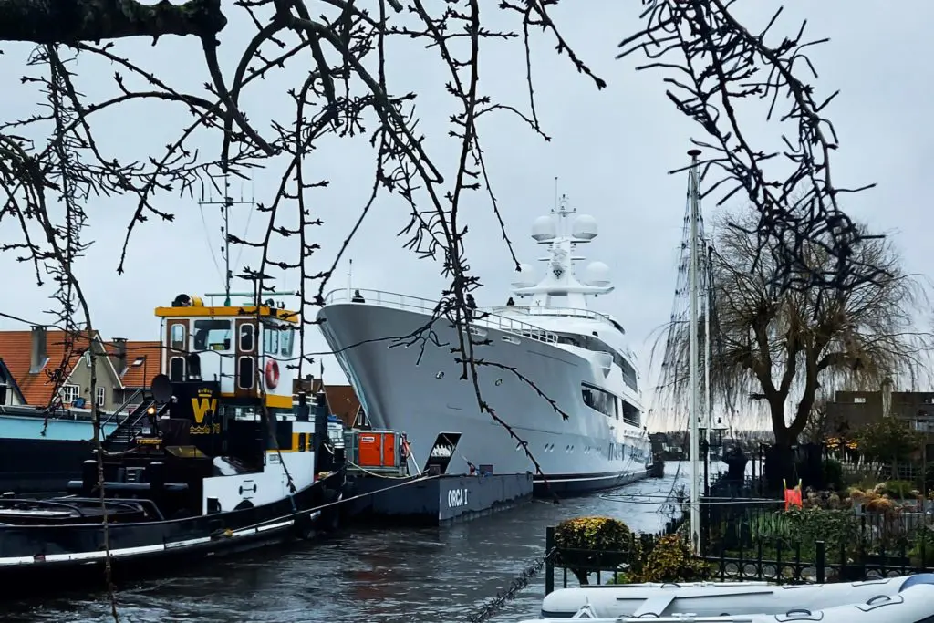 Tilman Fertitta's super yacht, Boardwalk,  by Feadship makes a beautiful departure as it heads for sea trials.