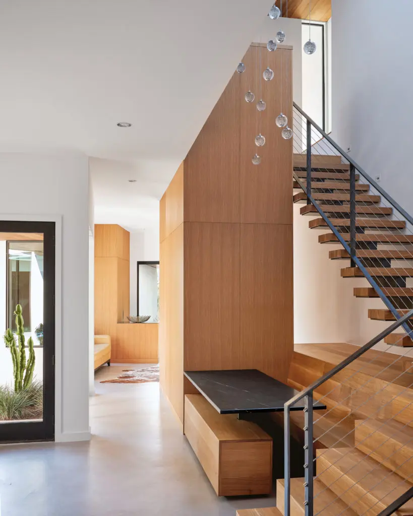 The Matt Fajkus Architecture addition met the client's desire for a private office, sitting area, mud room and powder room. (Photo  by Leonid Furmanksy & Matt Fajkus Architecture)