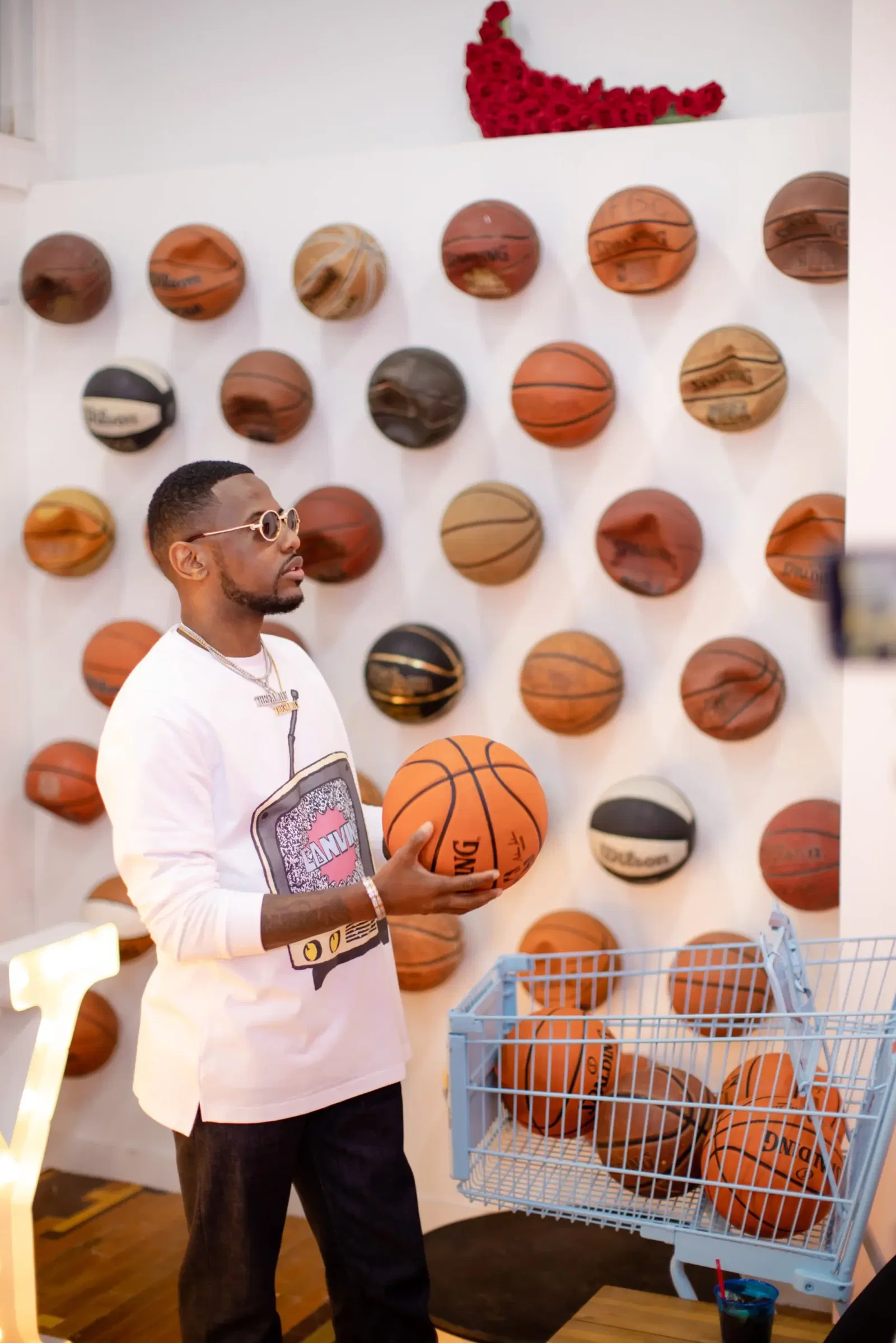 American rapper Fabolous worked with Japanese contemporary artist Takashi Murakami to design merchandise featuring the artist's iconic colorful smiley-faced flowers — but this time wearing a face mask. (Photo by J3 Photography)