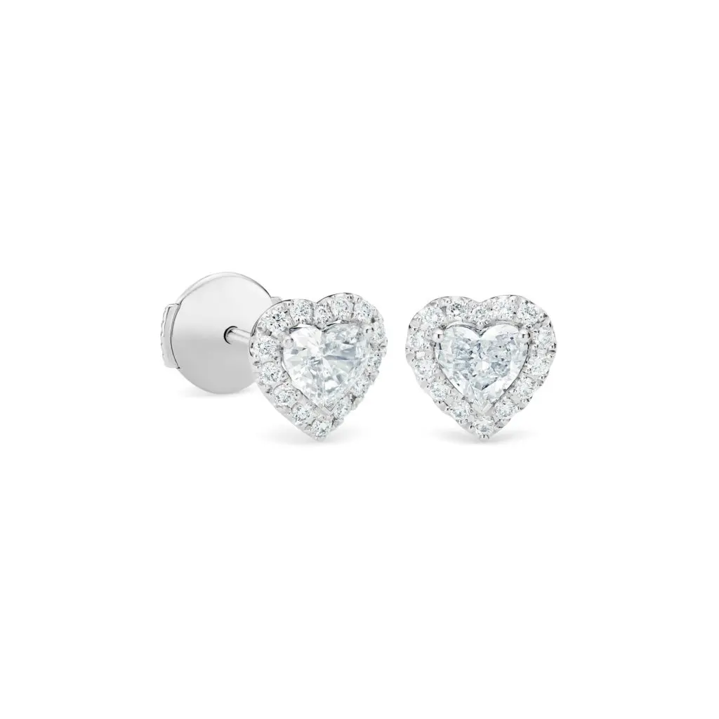 In February, De Beers launches its first heart-shaped diamond designs in a collection including these stud earrings.