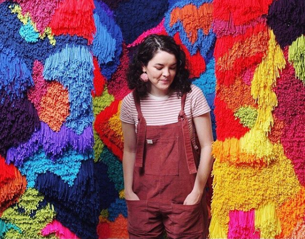 Fiber artist Jackie Lawrence may be shy, but her choice of colors is not. (Photo by Timothy Alsbrooks)