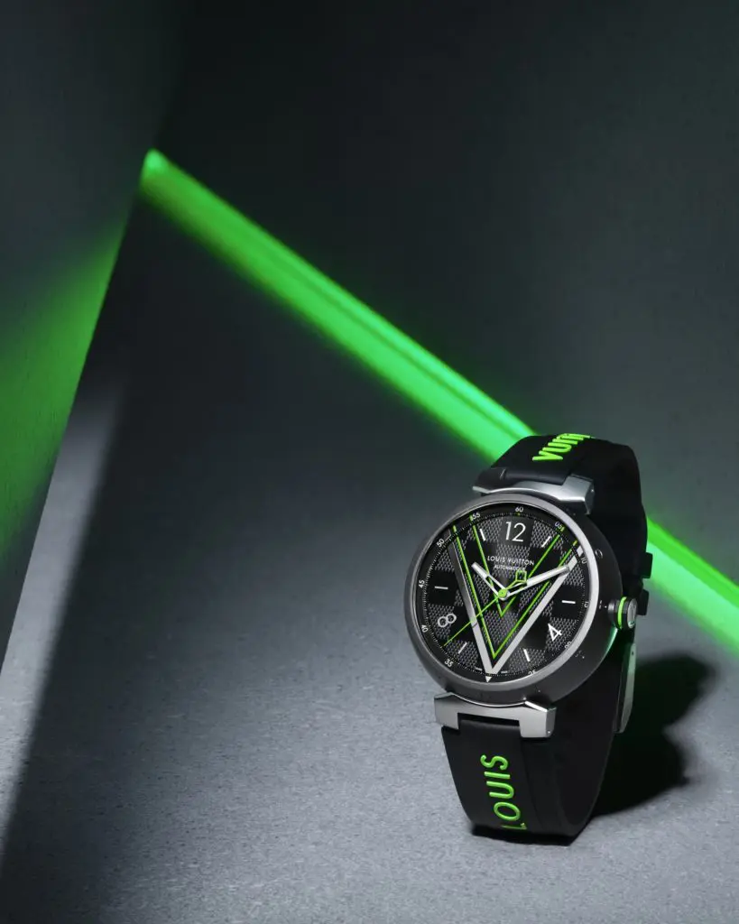 Louis Vuitton's Tambour watch is inspired by their iconic Damier Graphite canvas.