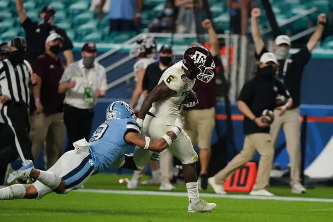 Texas A&M and running back Devon Achane of Fort Bend ran away from North Carolina in the Orange Bowl.