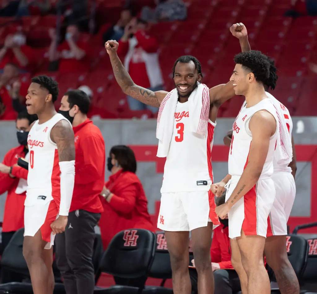 Marcus Sasser, DeJon Jarreau and Quentin Grimes play (and celebrate) seamlessly together. (Courtesy UH Athletics)