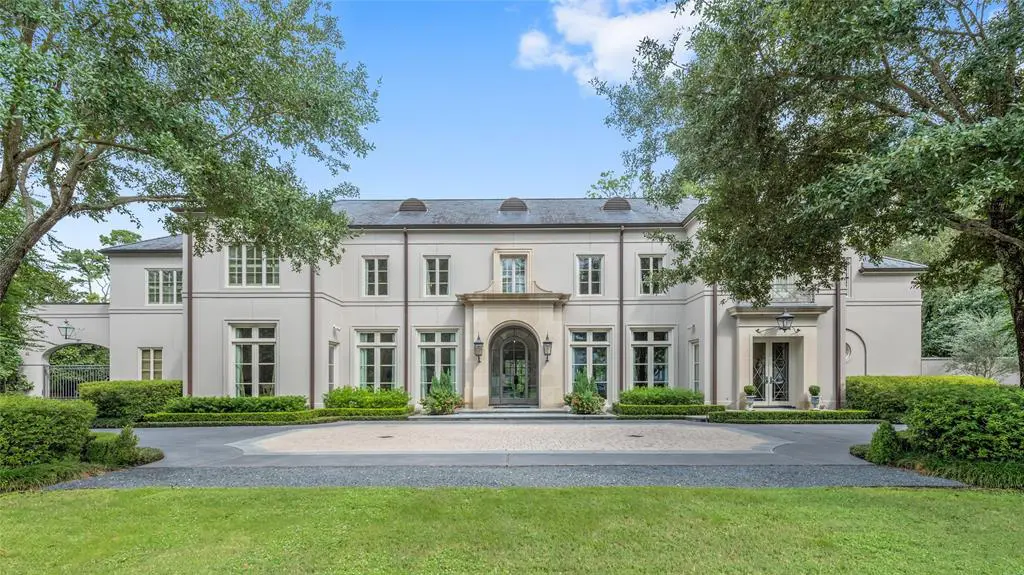 The Neo-Classical home in Piney Point Village was a custom design by Rudy Colby.