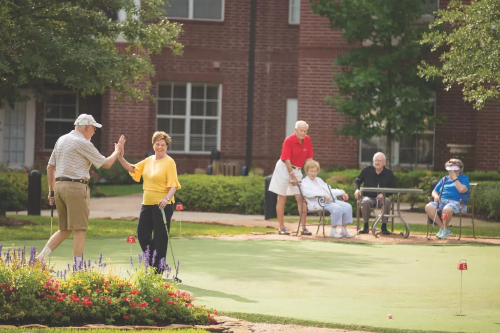 Croquet is among the numerous activities at The Buckingham senior living community in Houston that encourage friendships among residents.