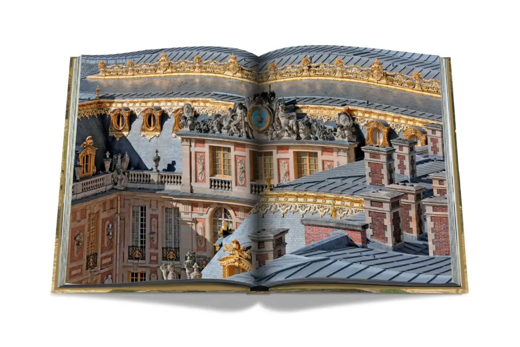 Photographs and images of works of art are individually hand-tipped, a process which requires cuttiing, gluing and placing each photograph onto the page. (Photo by Assouline)