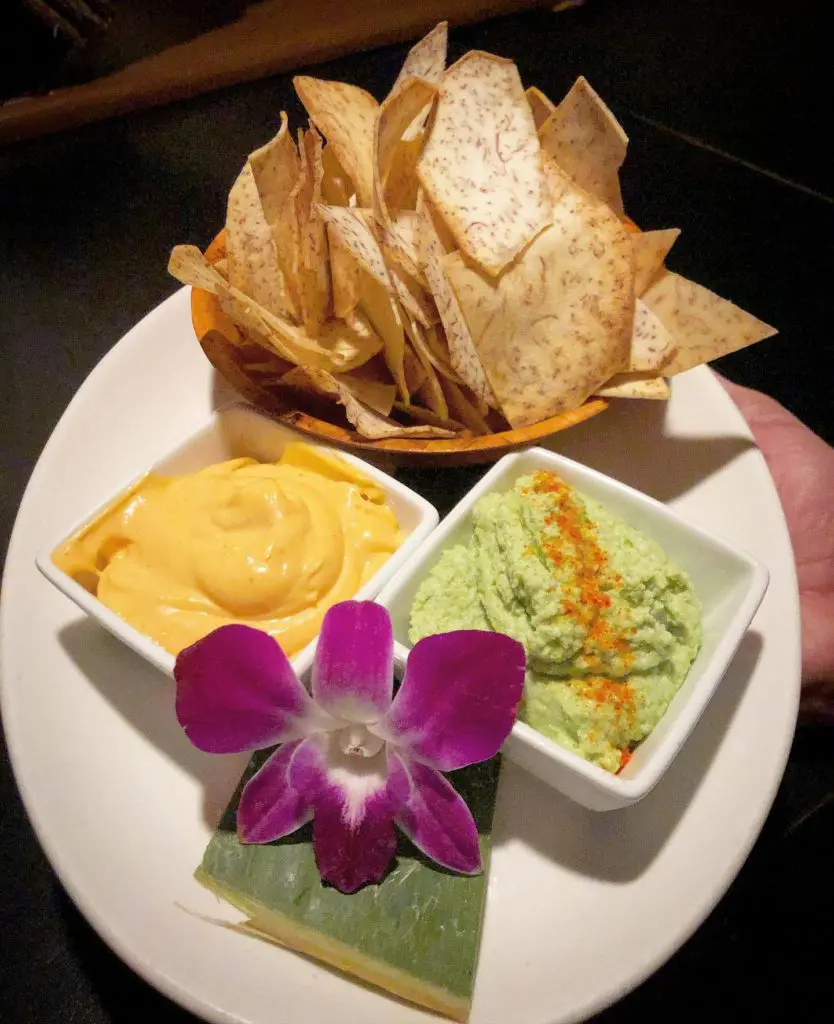 Make sure to start with the tarot chips with Sriracha aioli and edamame dips at Swizzle. (Courtesy of Swizzle)